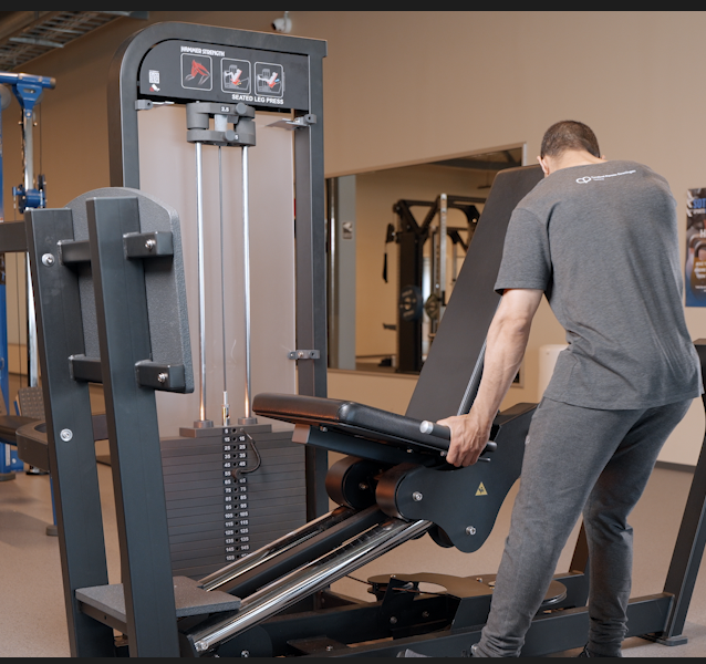 Person ved beinpressapparat